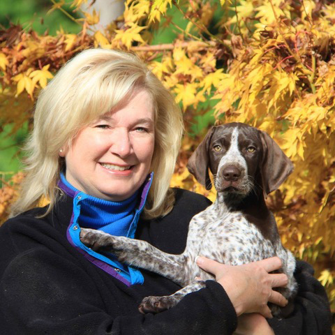 photo of Lynn and Dominic Pettinato with their German Shorthaired Pointer