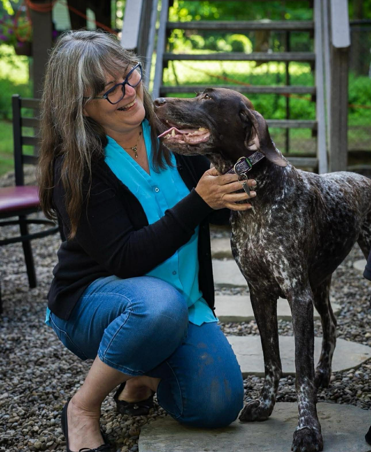 lady looking lovingly at german shorthaired pointer. GSPCA Sportsmanship Award